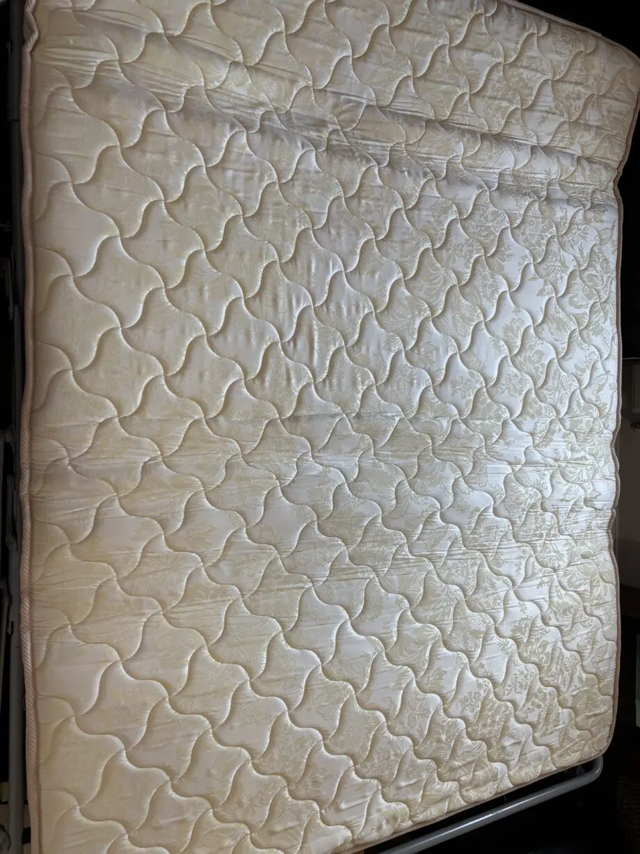 Harveys Brown leather sofa bed and footstool
