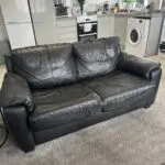 Black faux fur sofa