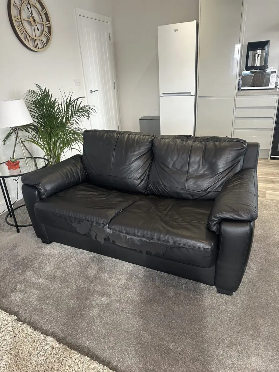 Black faux fur sofa