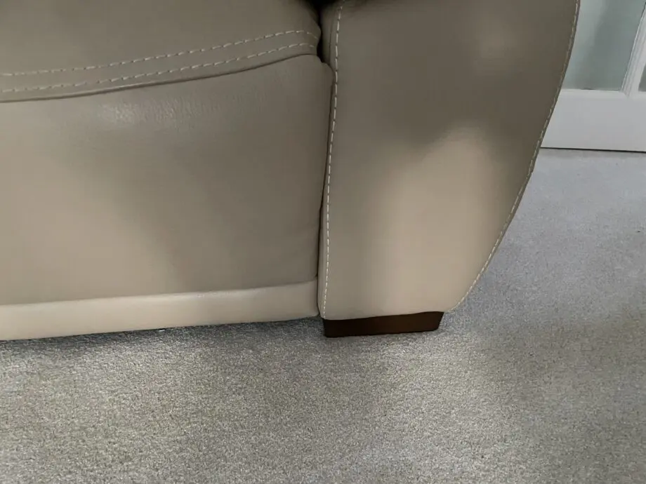 Beige leather sofa set. Purchased from Glasswells furniture store. Set comprises of one three seater sofa ( non recliner) and a two seater electric recliner