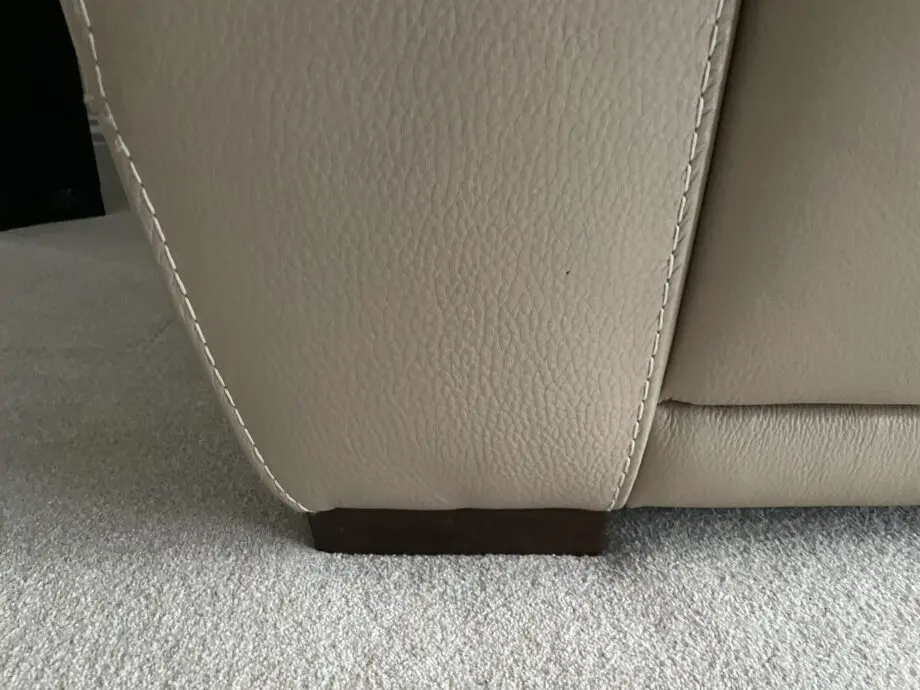 Beige leather sofa set. Purchased from Glasswells furniture store. Set comprises of one three seater sofa ( non recliner) and a two seater electric recliner