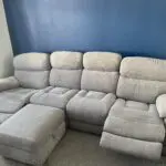 Sofology Grey Radley 4 seater sofa with dual recliner and storage footstool