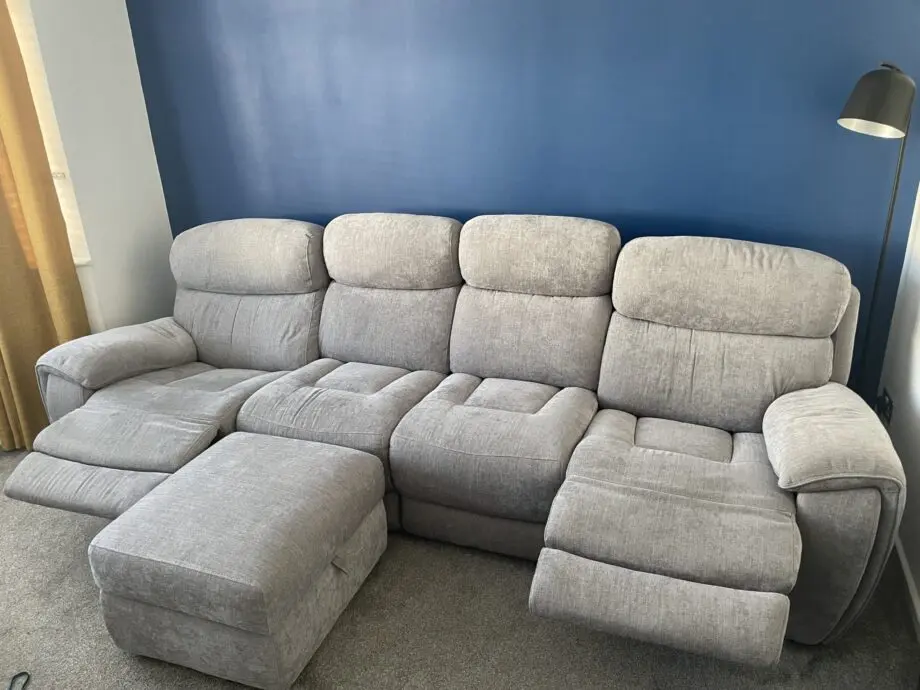 Sofology Grey Radley 4 seater sofa with dual recliner and storage footstool