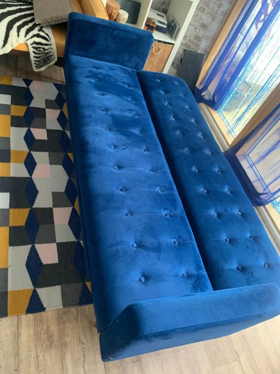 Navy blue velvet sofa
