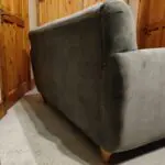 Grey w/yellow accents, two-person sofa