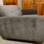Grey w/yellow accents, two-person sofa
