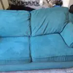 DFS Blue 2 Seater Sofa Bed and Footstall