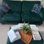 Brand new DFS sofas for sale premium quality barley used in a excellent condition gorgeous green sofas and 1 seater sofa which is brown with a little green table of the set