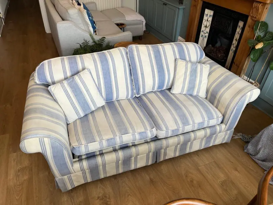 Laura Ashley blue and cream striped sofa bed