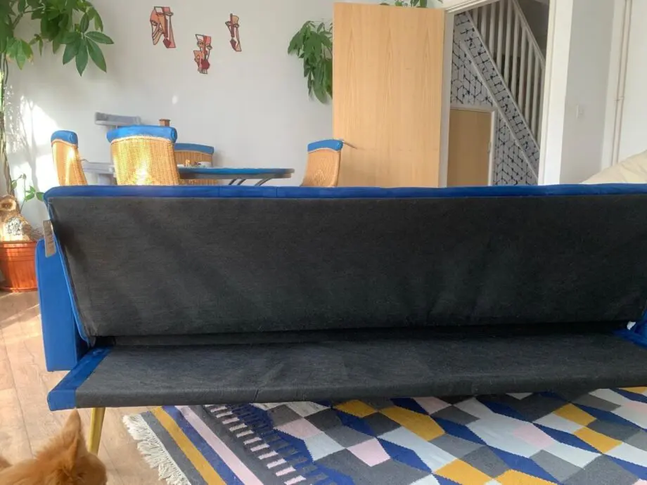 Navy blue velvet sofa