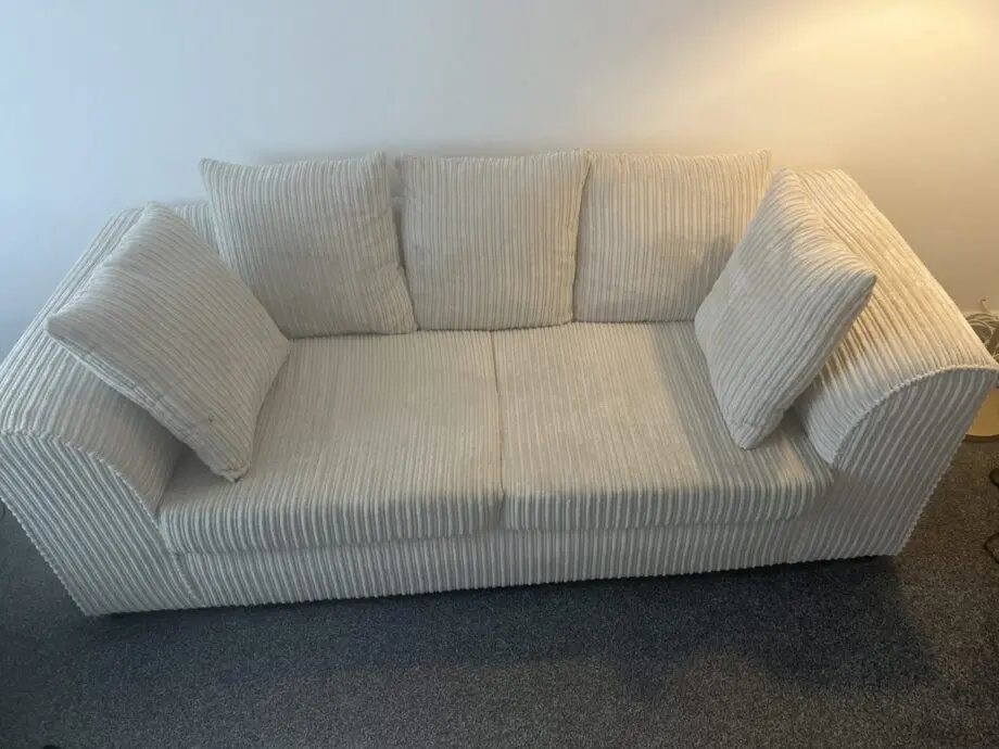 Beige 2 seater sofa