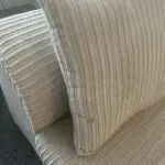 Beige 2 seater sofa