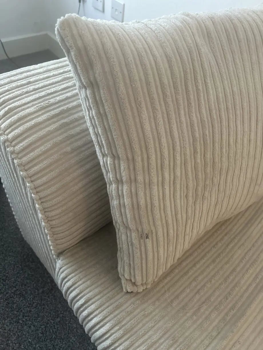 Beige 2 seater sofa