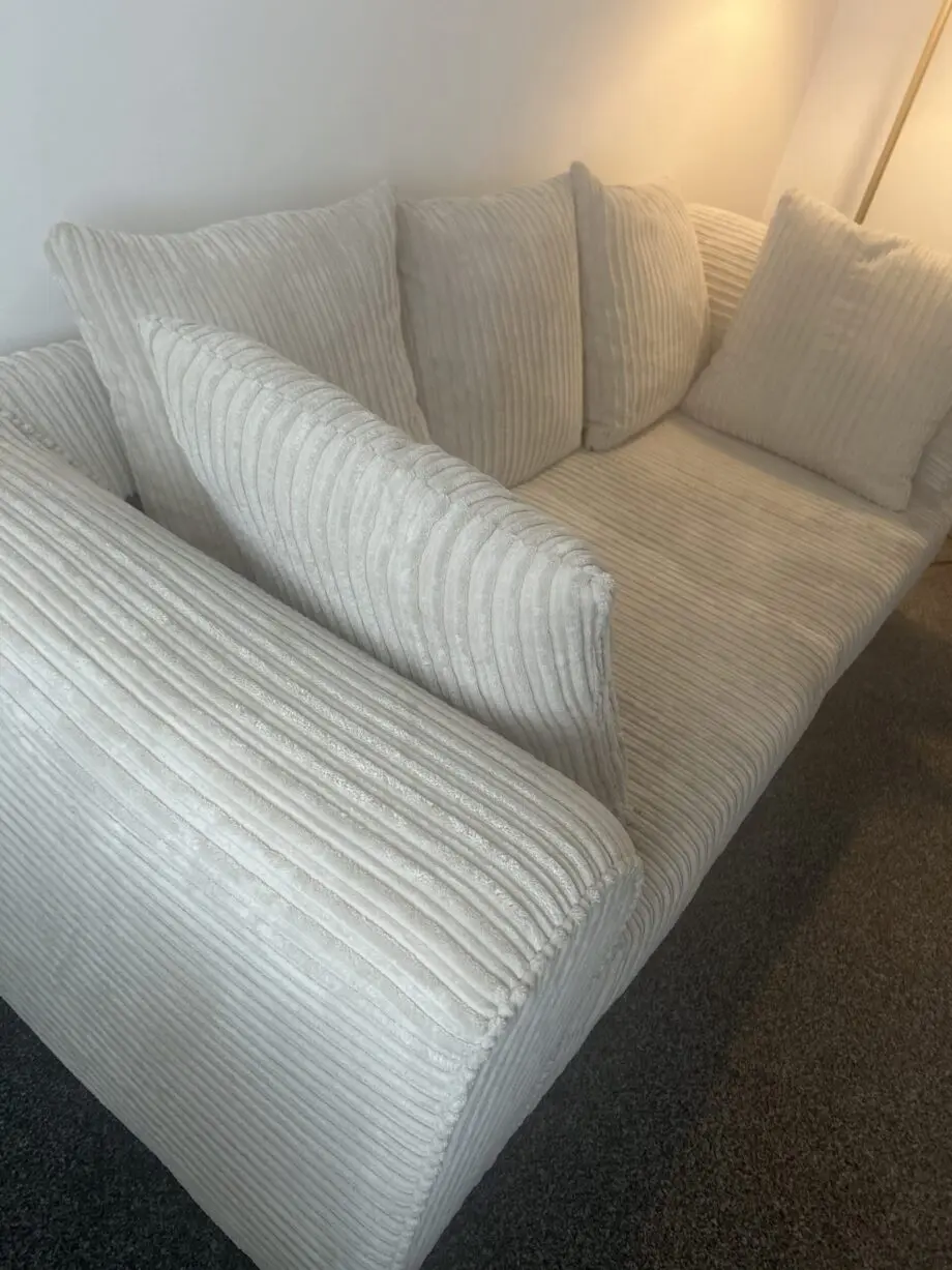 Beige 2 seater sofa