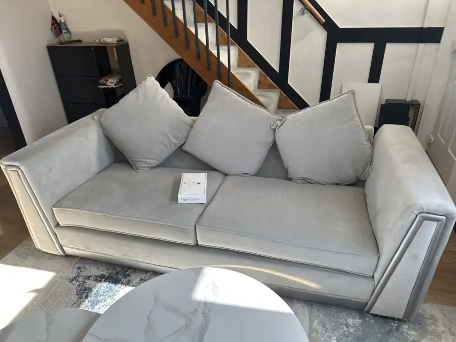 3 seater silver white sofa in perfect condition, no