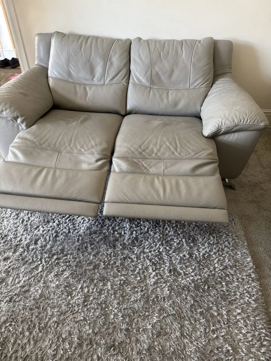 Natuzzi Grey Leather with powered recliner