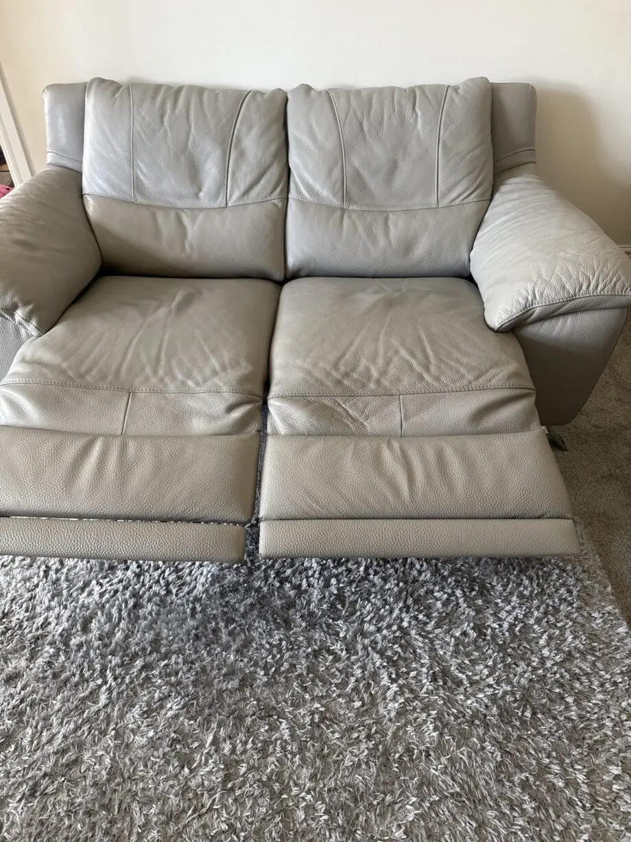 Natuzzi Grey Leather with powered recliner