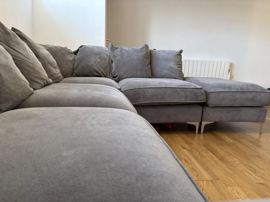 Grey 4-seater Corner Sofa with Footrest/Additional Seat