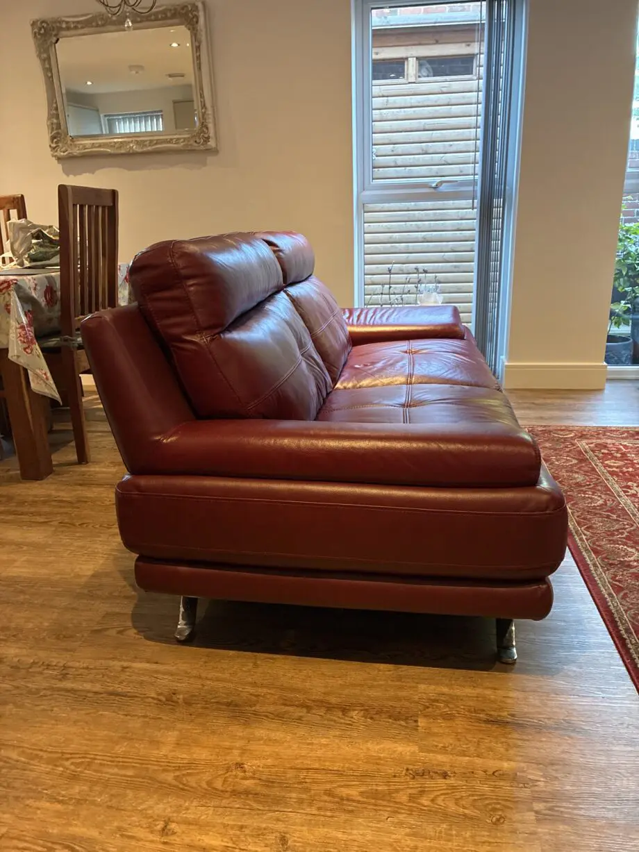 Red leather large 2/3 seater Harvey’s sofa