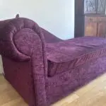 Dark red chaise-longue sofa bed