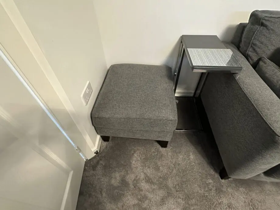 2 x Grey Bronby Right Hand Corner Sofas from Furniture VIllage, 3 yrs old, excellent condition as new, and storage footstool