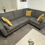 2 x Grey Bronby Right Hand Corner Sofas from Furniture VIllage, 3 yrs old, excellent condition as new, and storage footstool