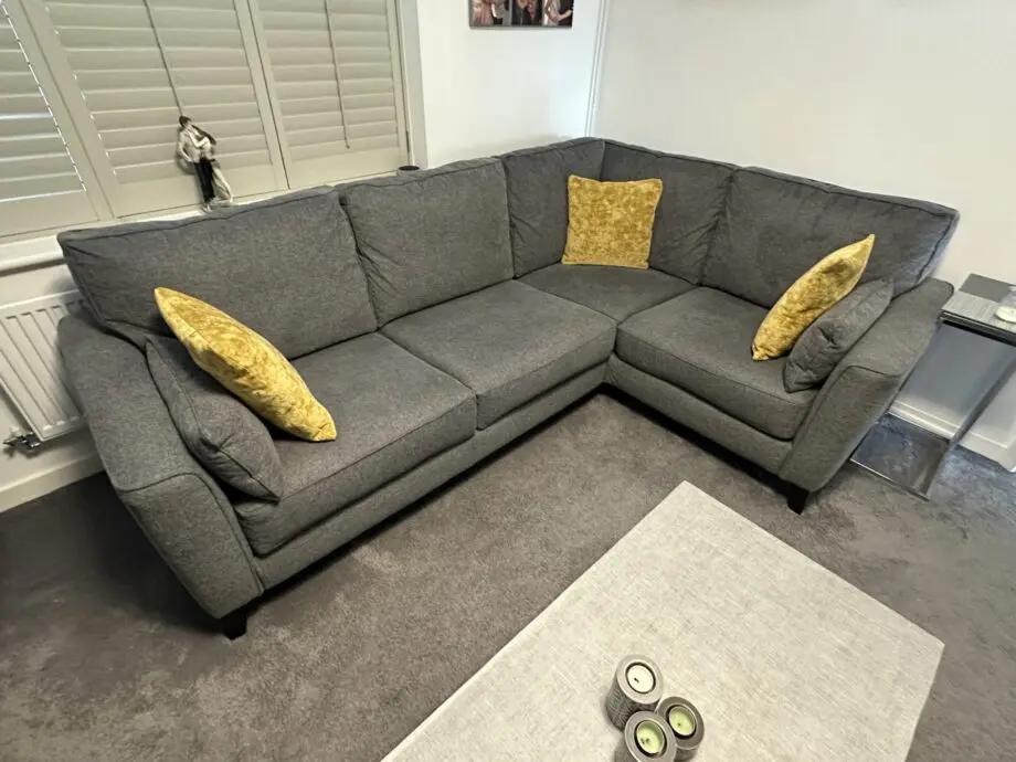 2 x Grey Bronby Right Hand Corner Sofas from Furniture VIllage, 3 yrs old, excellent condition as new, and storage footstool