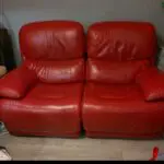 Furniture Village, Red Leather, Rocco, 2 seater sofa with central storage and cup holder and an Armchair.