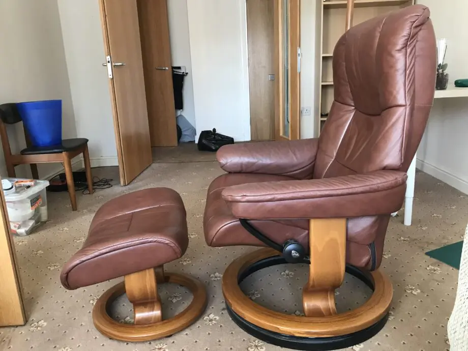 Parker Knoll brown leather chair and footstool