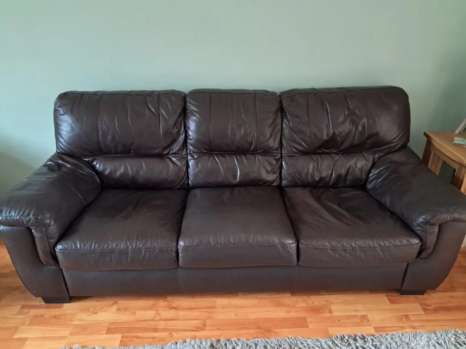 DFS dark brown leather sofa