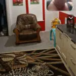 Brown leather sofa and foot stool