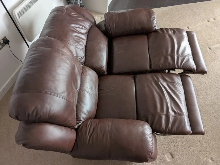 Harveys Brown Leather 2-Seater Recliner Sofa with Storage Footstool