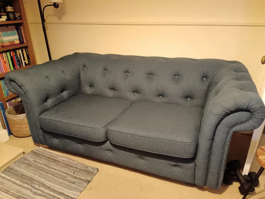 DFS Belair dark blue 2 seater sofabed excellent condition