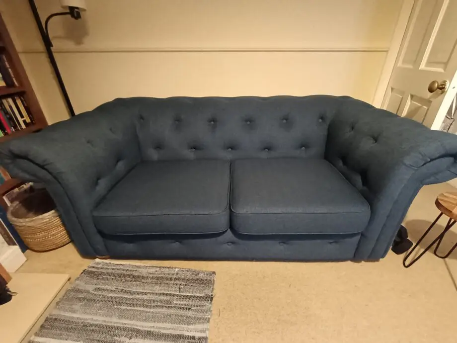 DFS Belair dark blue 2 seater sofabed excellent condition