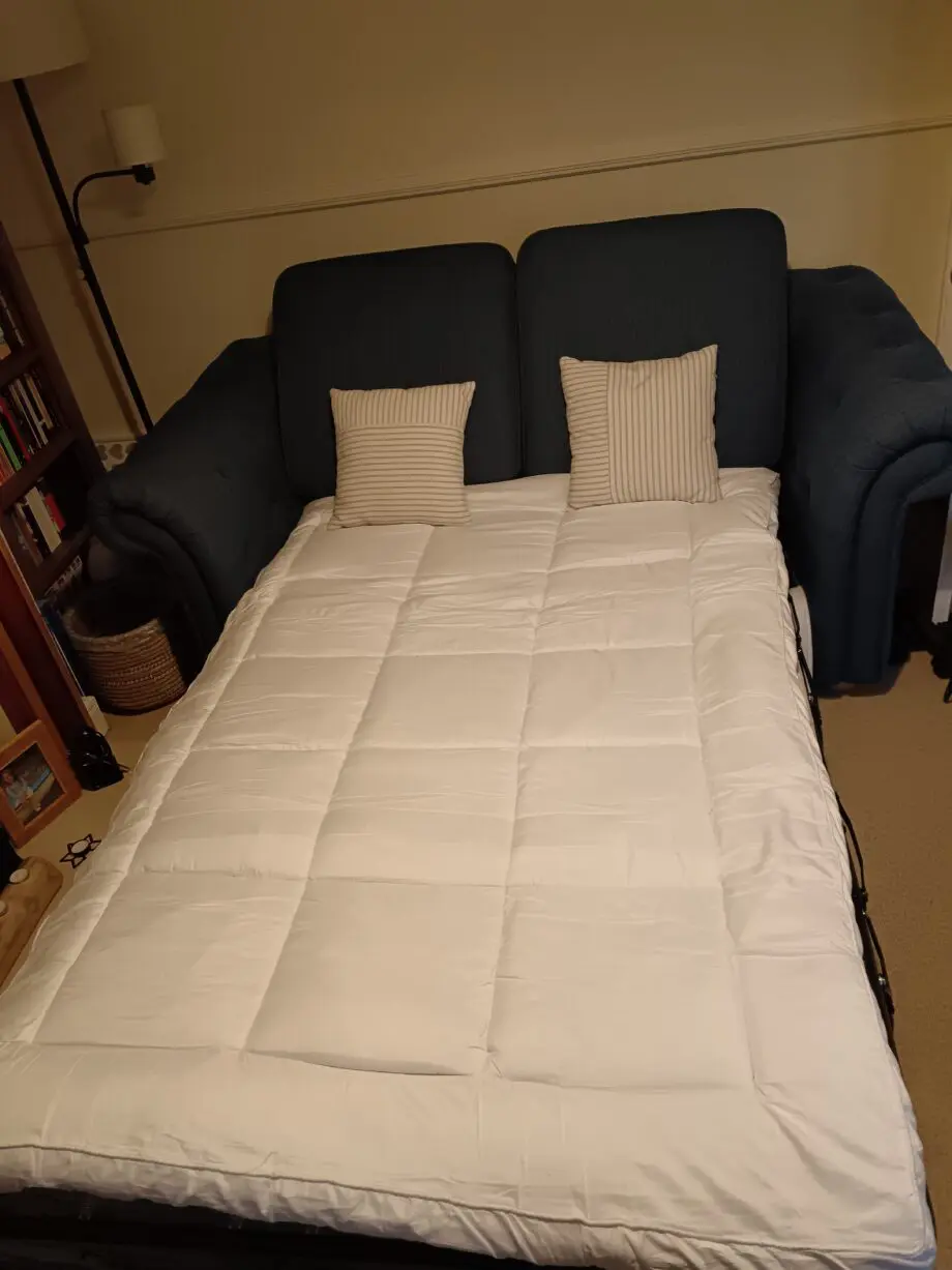 DFS Belair dark blue 2 seater sofabed excellent condition