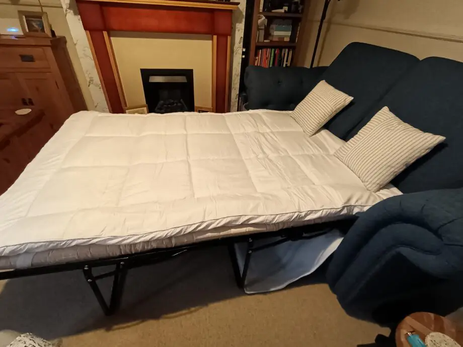 DFS Belair dark blue 2 seater sofabed excellent condition