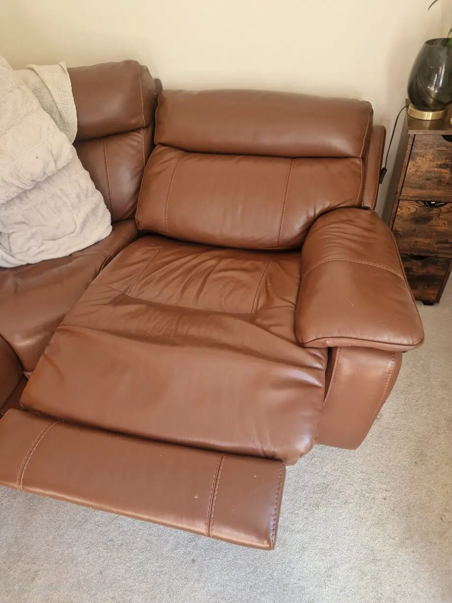 DFS Brown leather corner and console and footstall