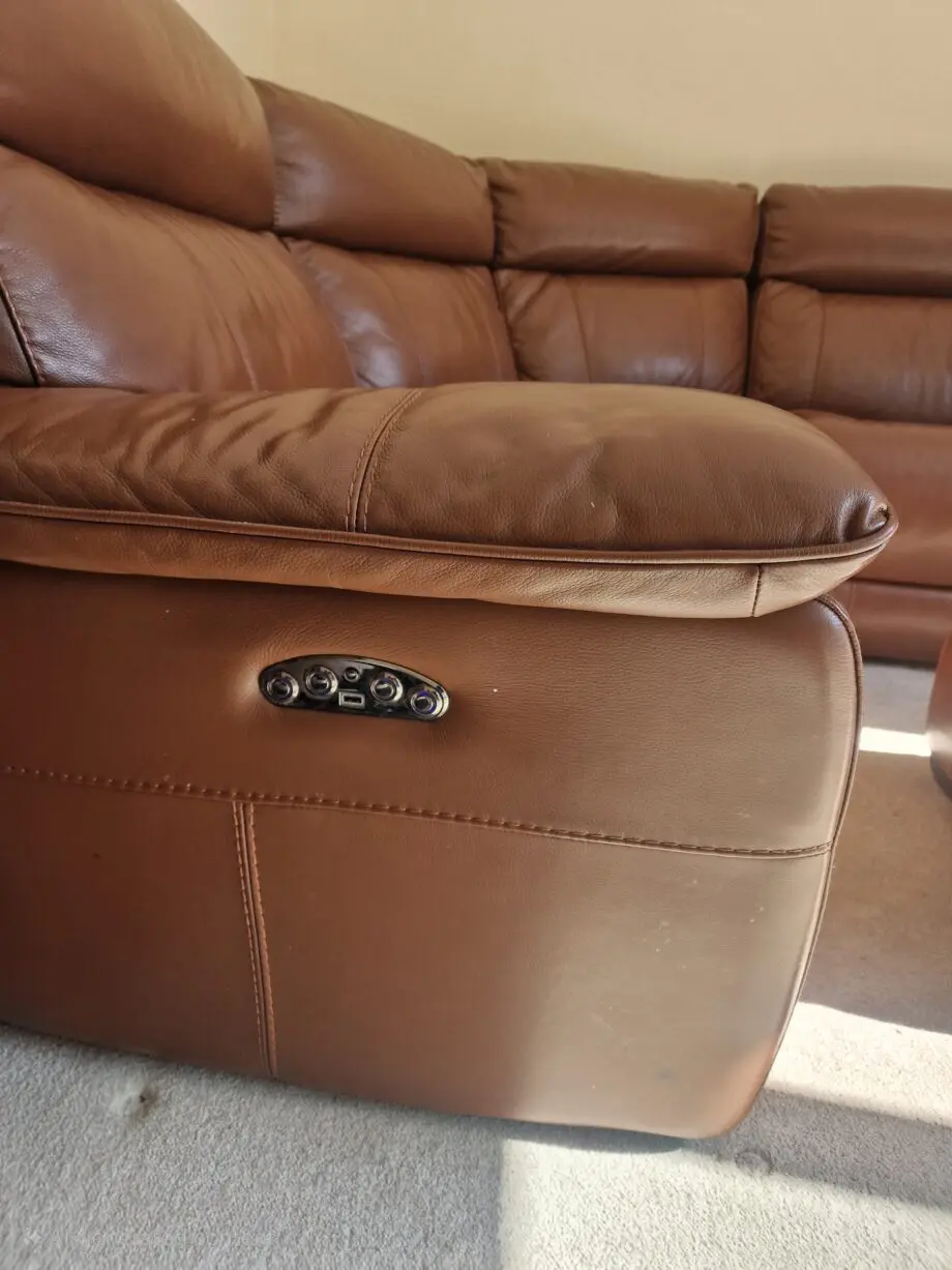 DFS Brown leather corner and console and footstall