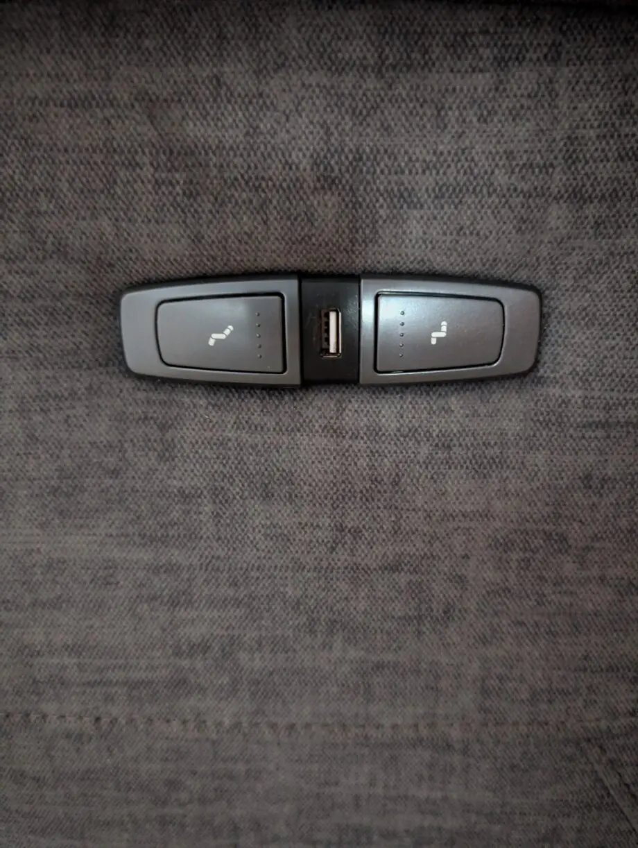 Electric reclining sofa with fold away table and reading lights