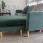 L shaped emerald green sofa