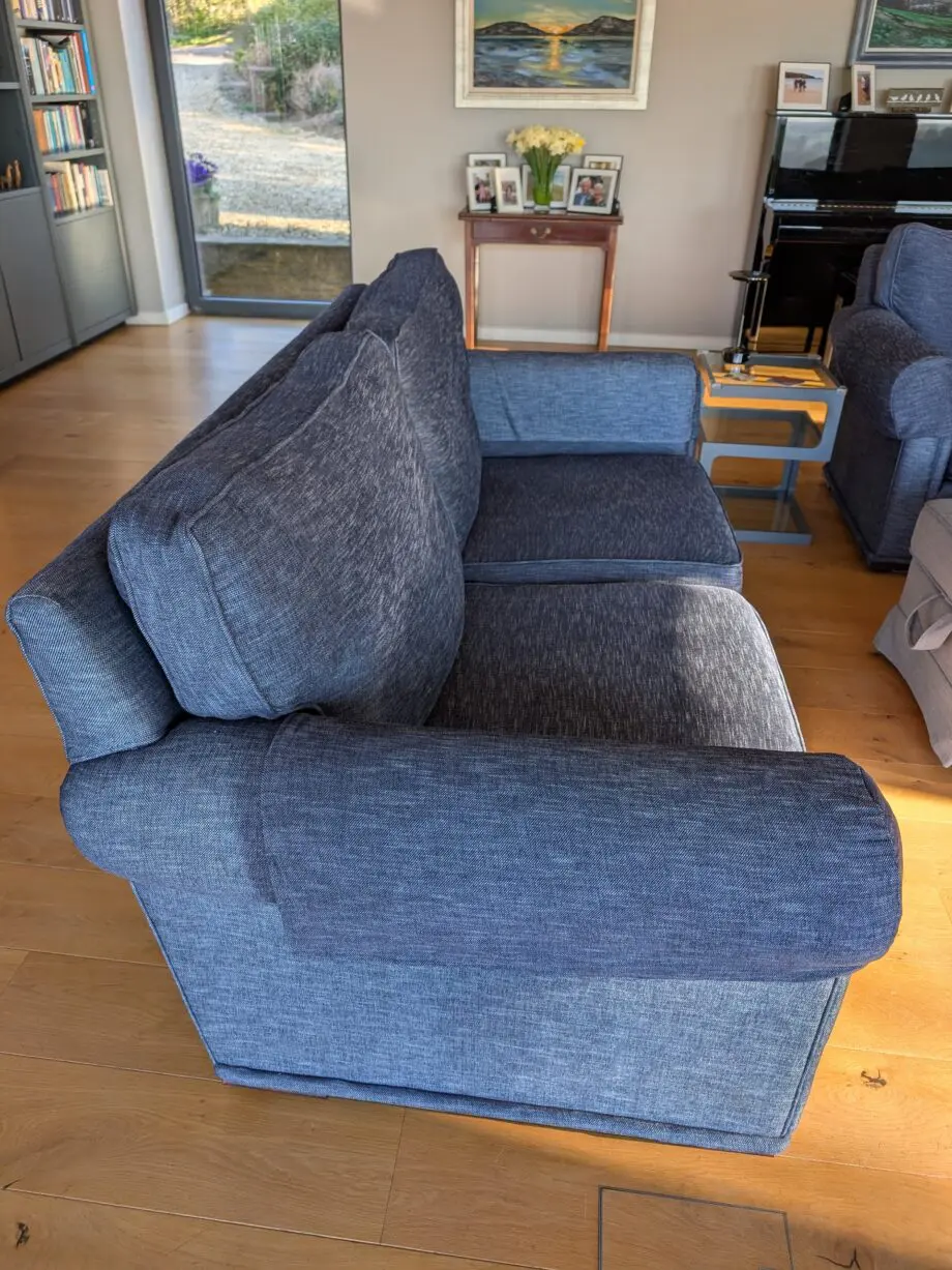 Pair of blue three seater sofas