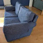 Pair of blue three seater sofas