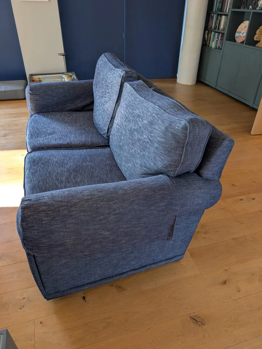 Pair of blue three seater sofas