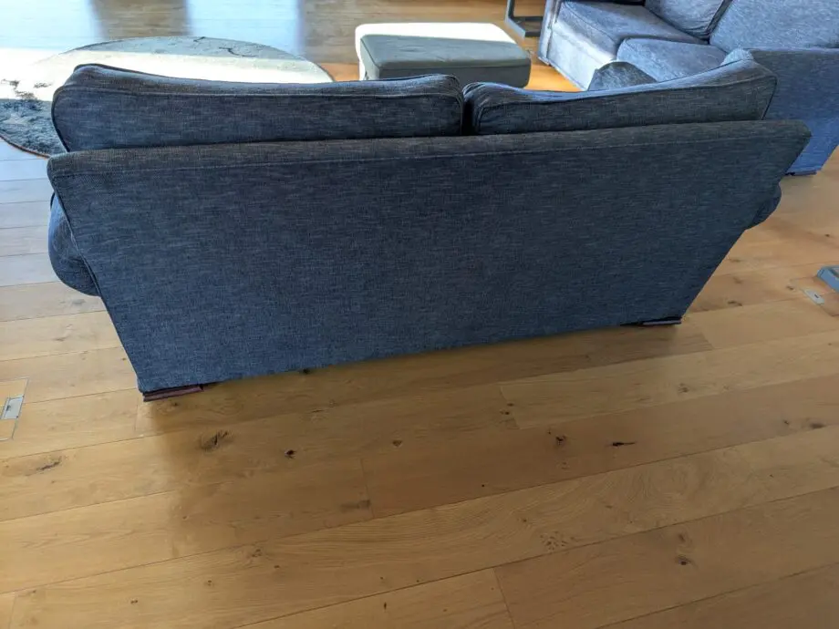 Pair of blue three seater sofas