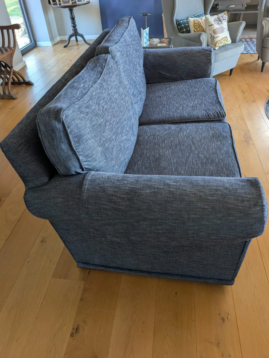Pair of blue three seater sofas