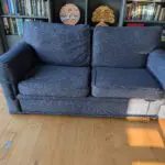 Pair of blue three seater sofas