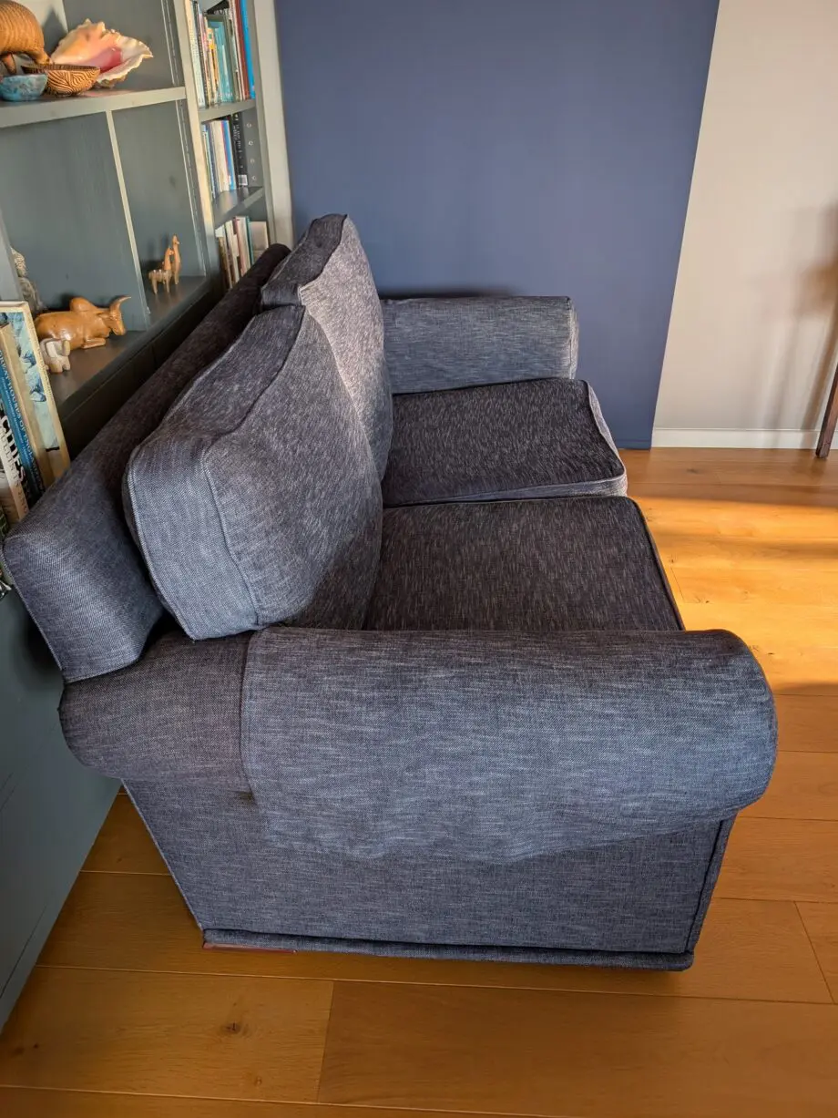 Pair of blue three seater sofas