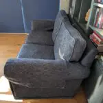 Pair of blue three seater sofas