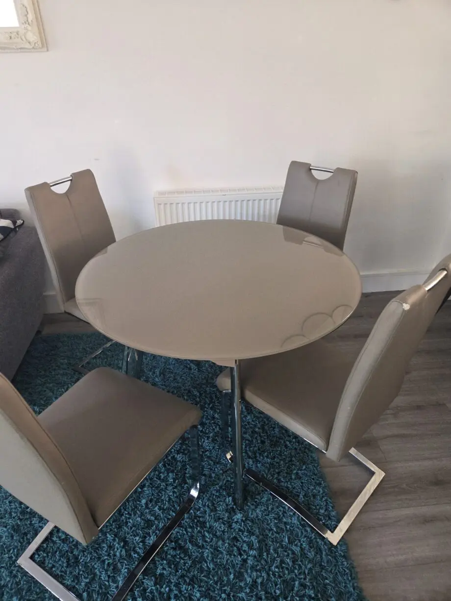 Glass dining table with 4 chairs