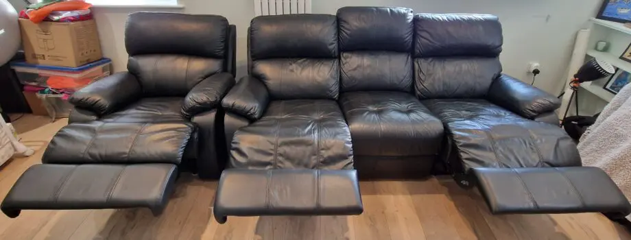 Sofology Black Leather Reclining Sofa and Chair (excellent condition)